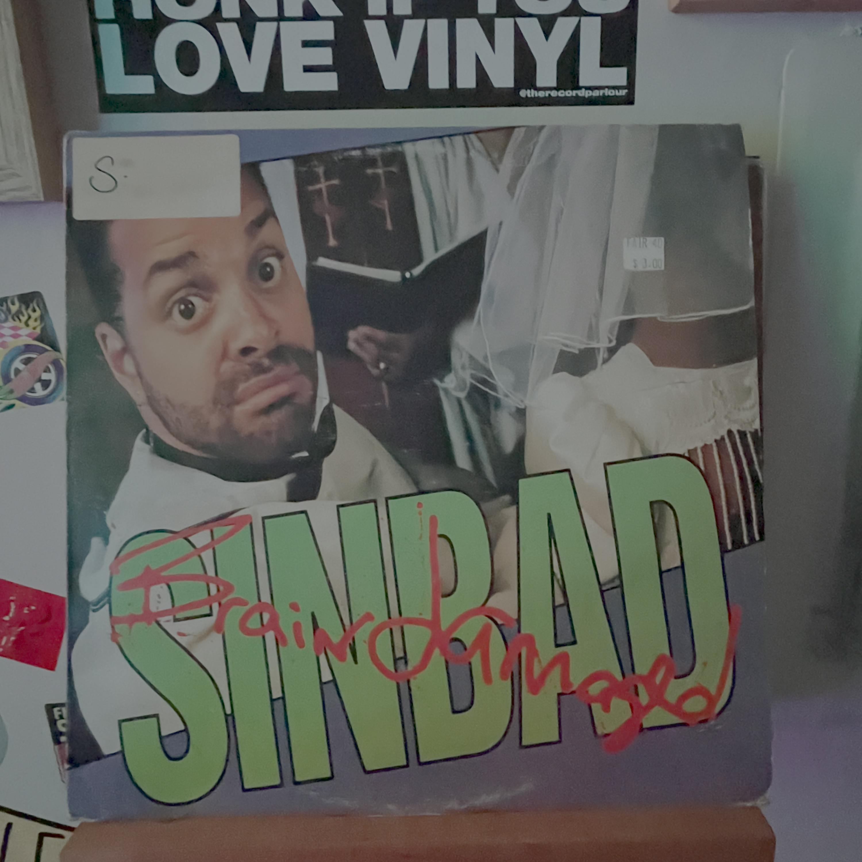 Episode 12: Martha Kelly listens to Sinbad's "Brain Damaged" episode artwork